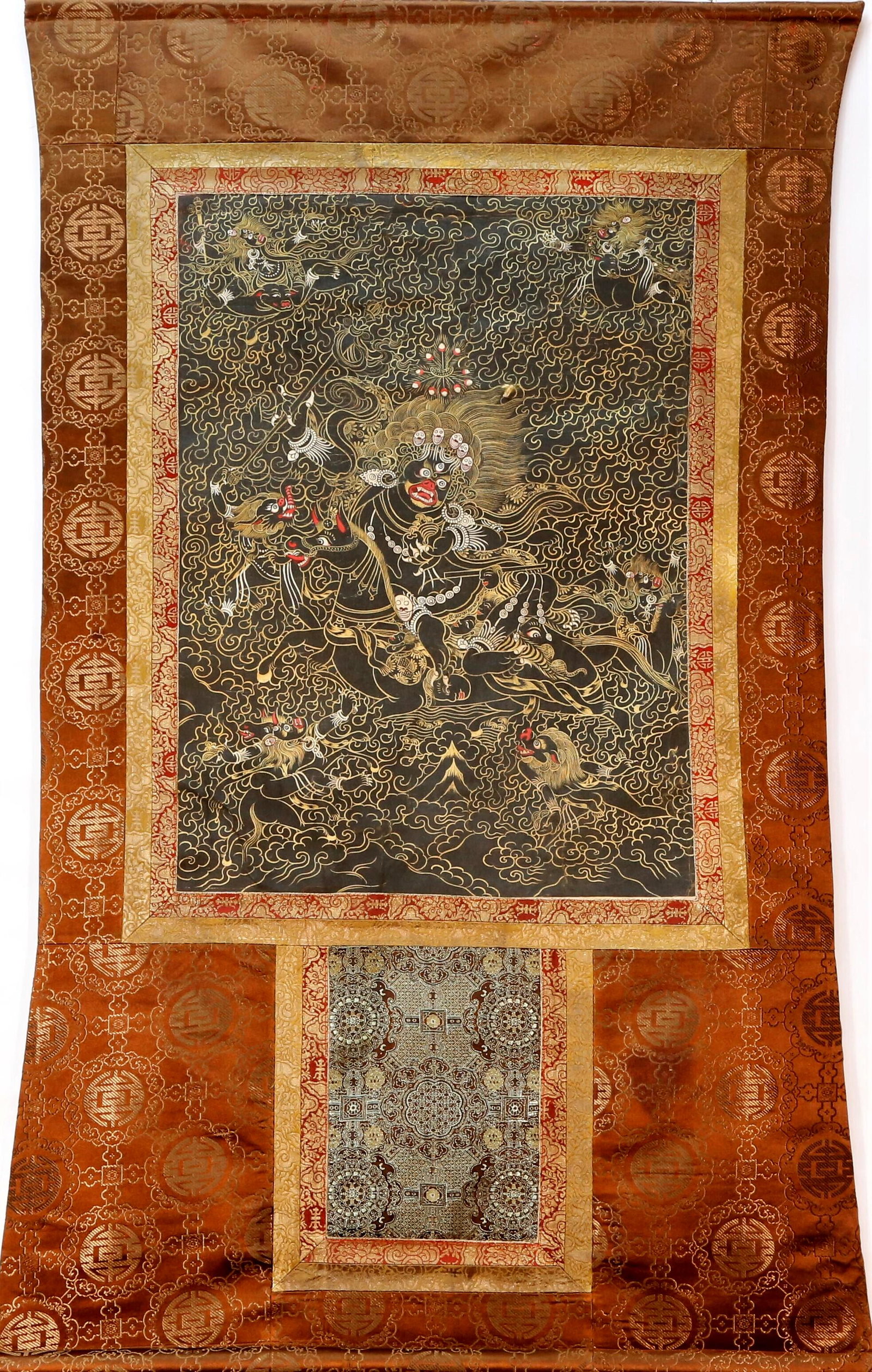 An Elaborate Tibetan Horse Ridding Mammon Thangka: An Elaborate Tibetan Horse Ridding Mammon Thangka. with Words of Buddhism Sutras in Tibetan Characters. Chinese Qing Dynasty.Size: 93cmx153cm