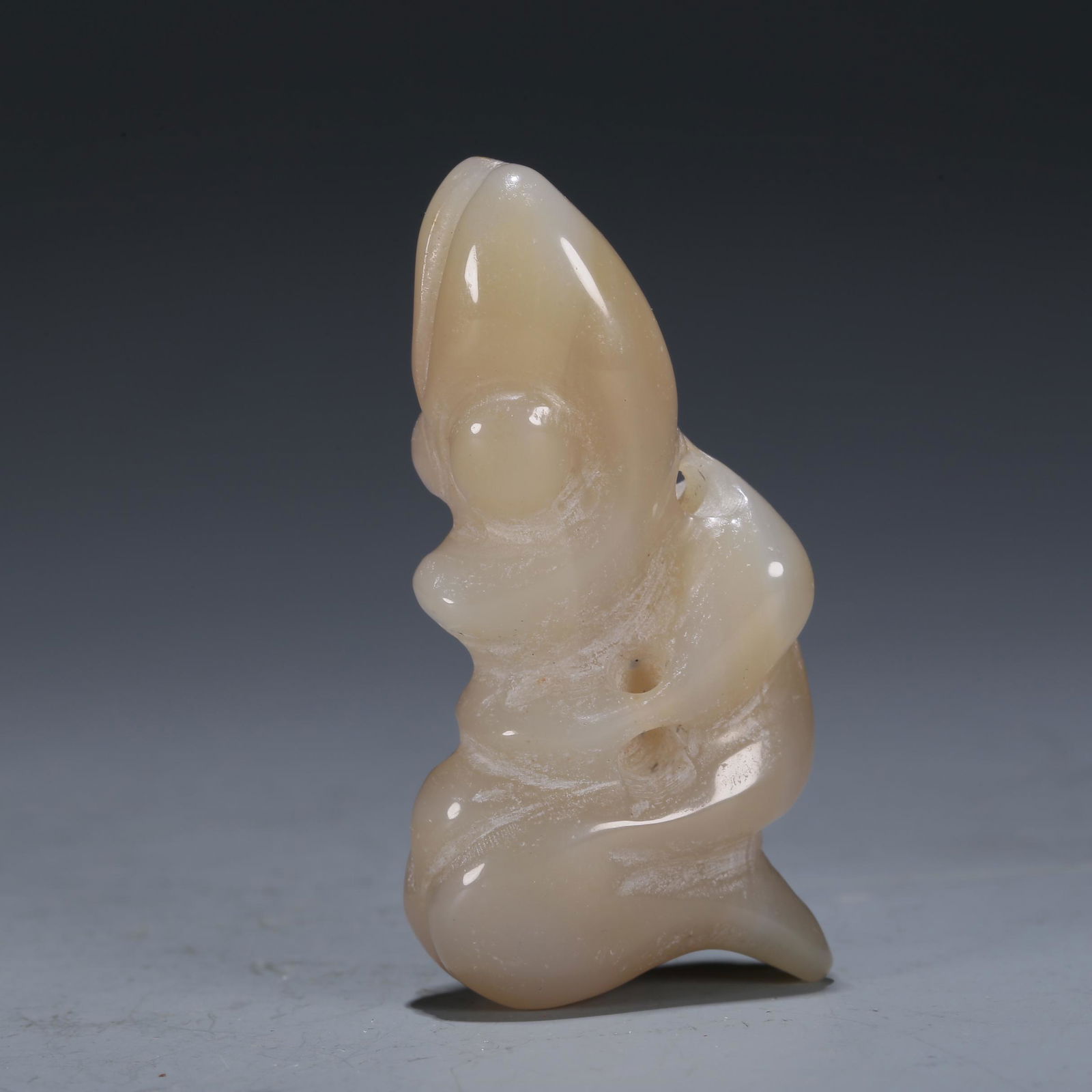 A Hongshan Culture Agate 'Dragon' Pendant (1 of 4)