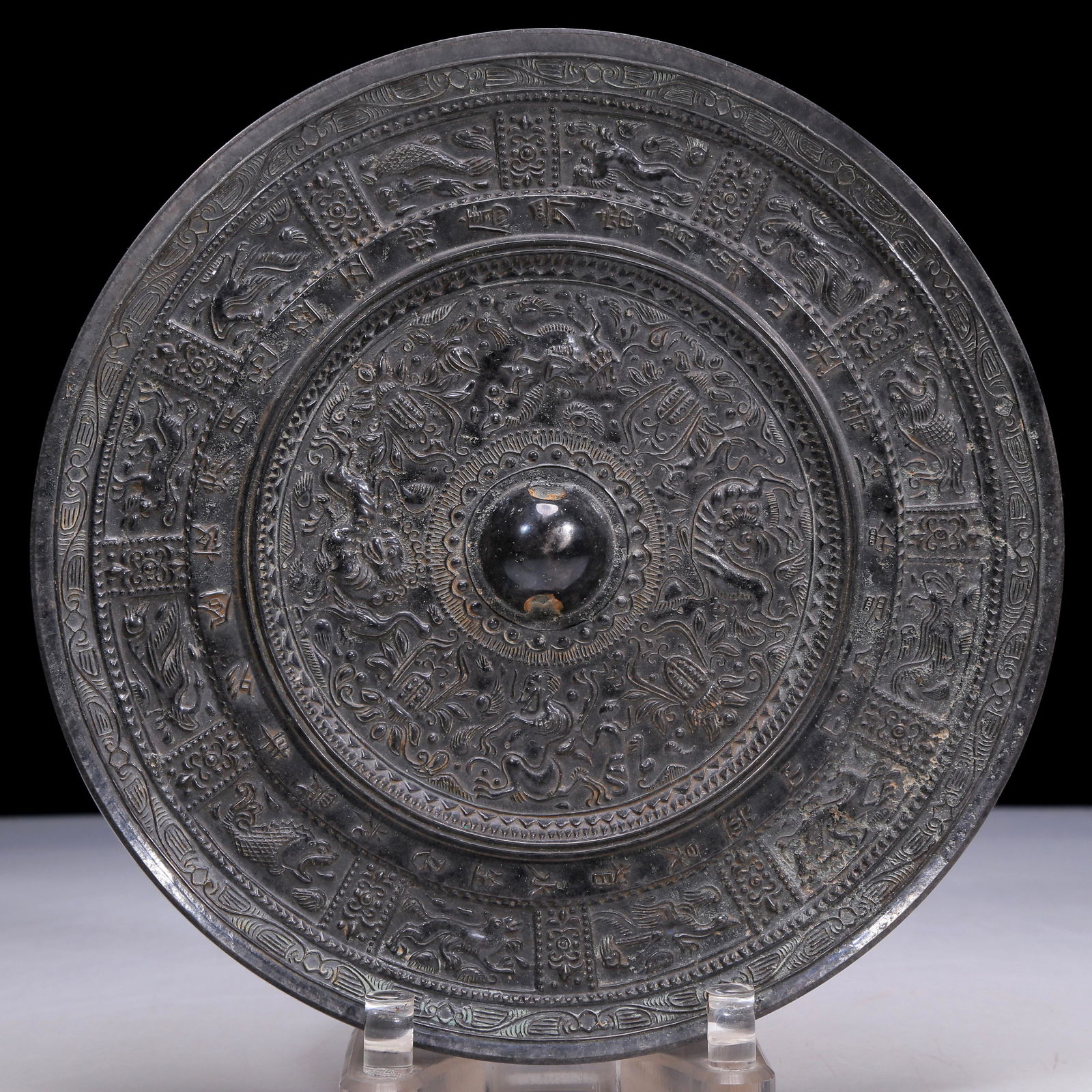 An Archaic Circular Bronze 'Scrolling Lotus& Auspicious Beast' Mirror With Inscriptions (1 of 8)