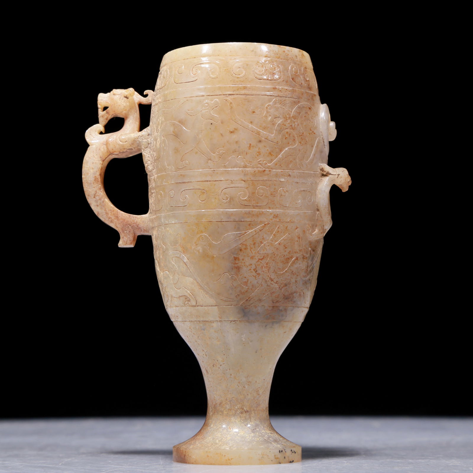 An Archaic White Jade 'Dragon& Phoenix' Cup (1 of 8)