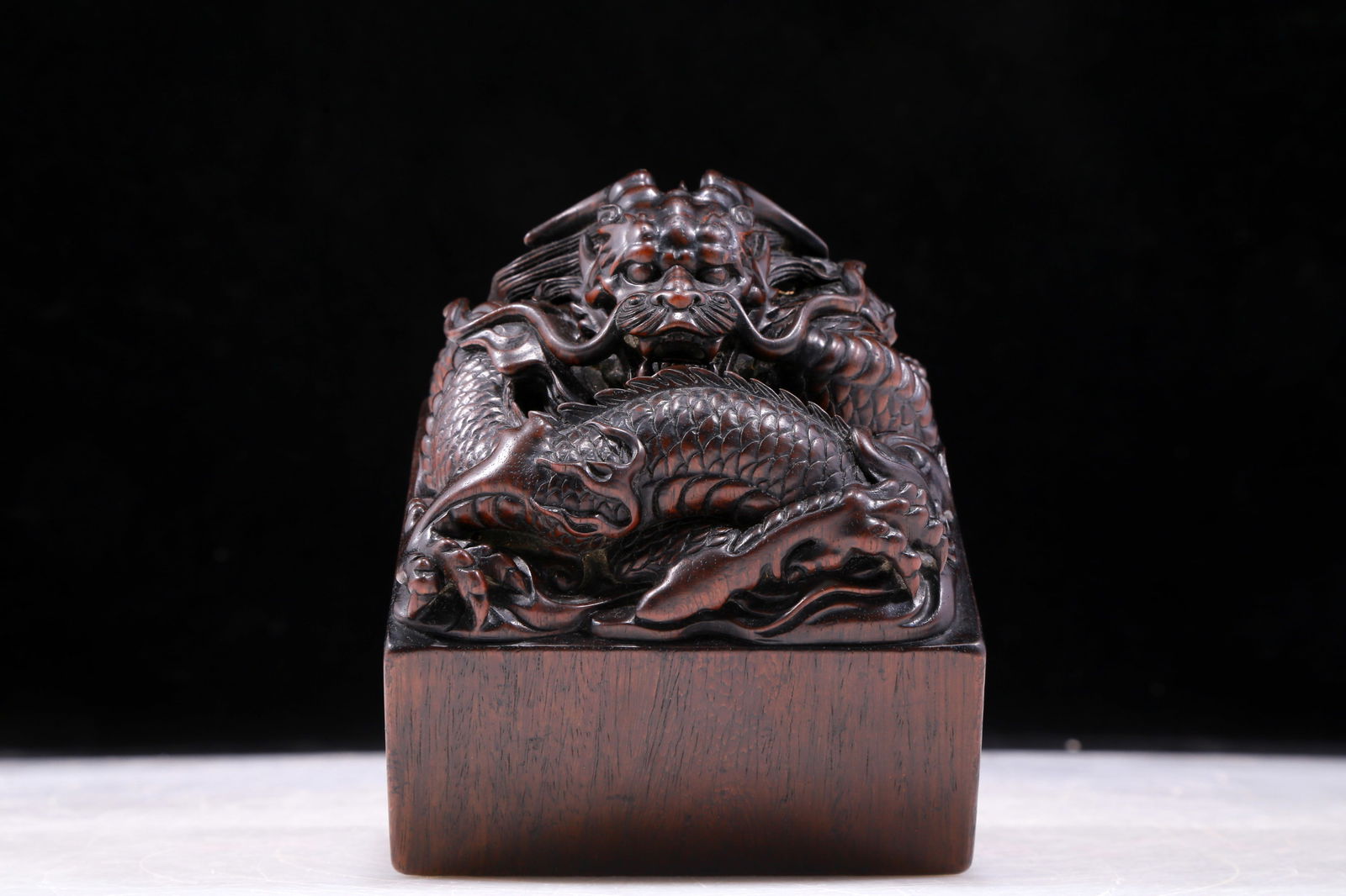 An exquisite zitanwood seal with auspicious clouds and dragon pattern (1 of 6)