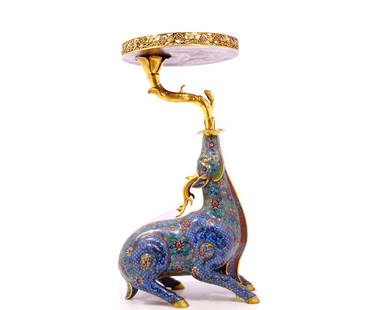 An exquisite cloisonné deer-shaped ornament with lotus pattern: A cloisonné deer-shaped ornament with entwining lotus patterns, Qianlong four-character design, Qing Dynasty, China. The lifelike shape of this ornament, with a gorgeous deer shape as the theme,