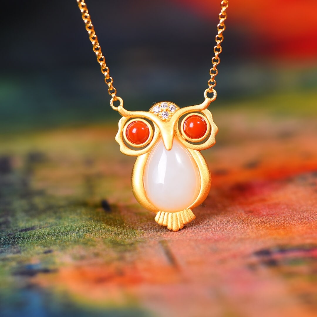 Gilt silver inlaid Hetian jade drop-shaped southern red owl (1 of 6)