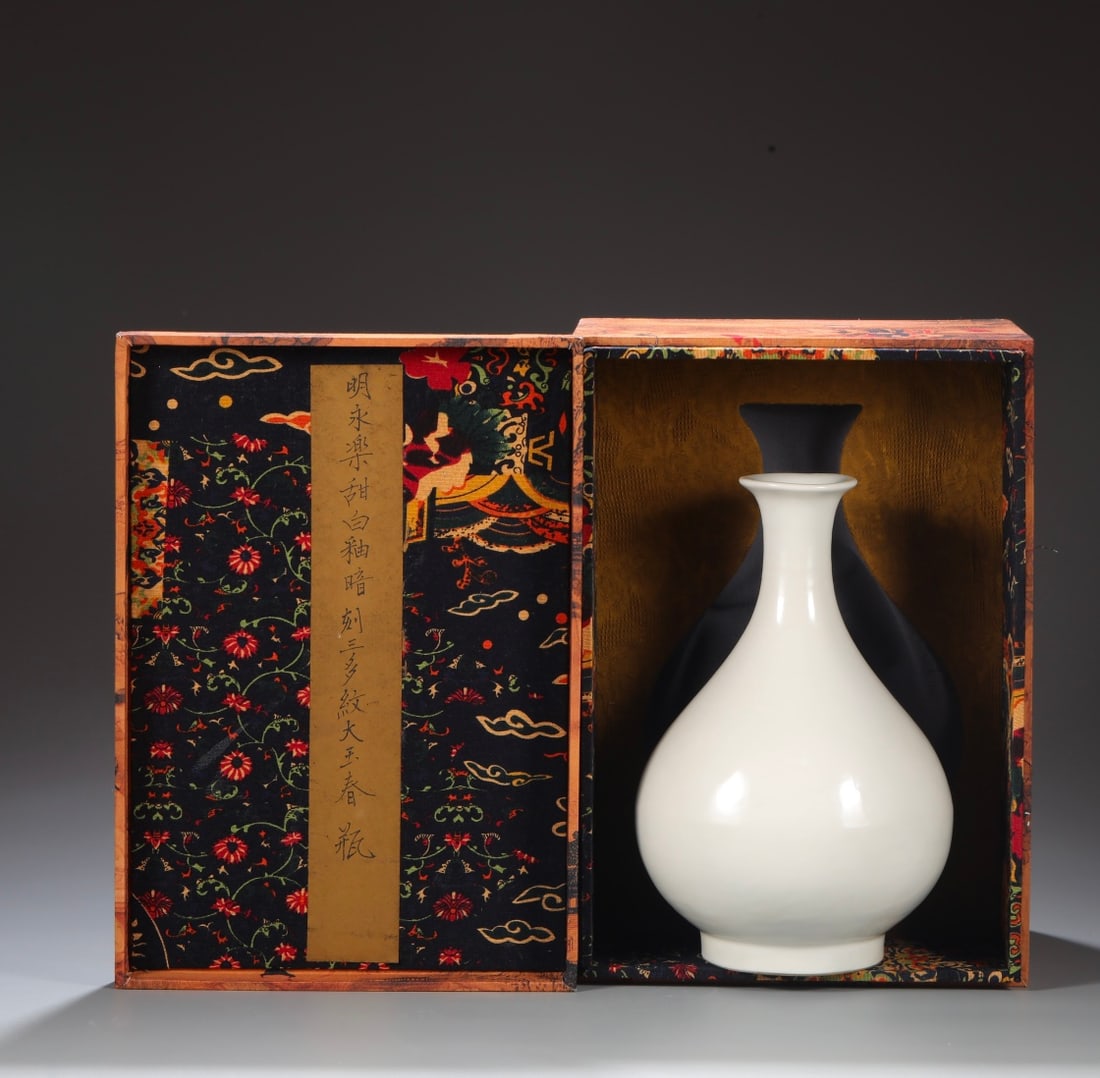 An Exquisite White Glazed Flower and Fruit Pattern Vase (1 of 9)