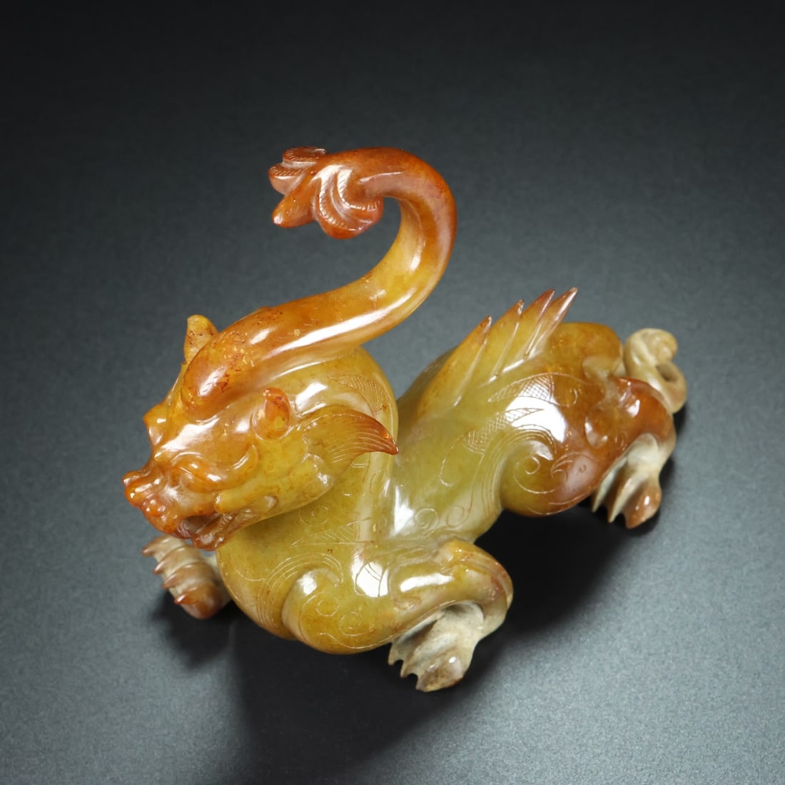 A Rare Gaogu Jade Auspicious Beast Ornament (1 of 9)
