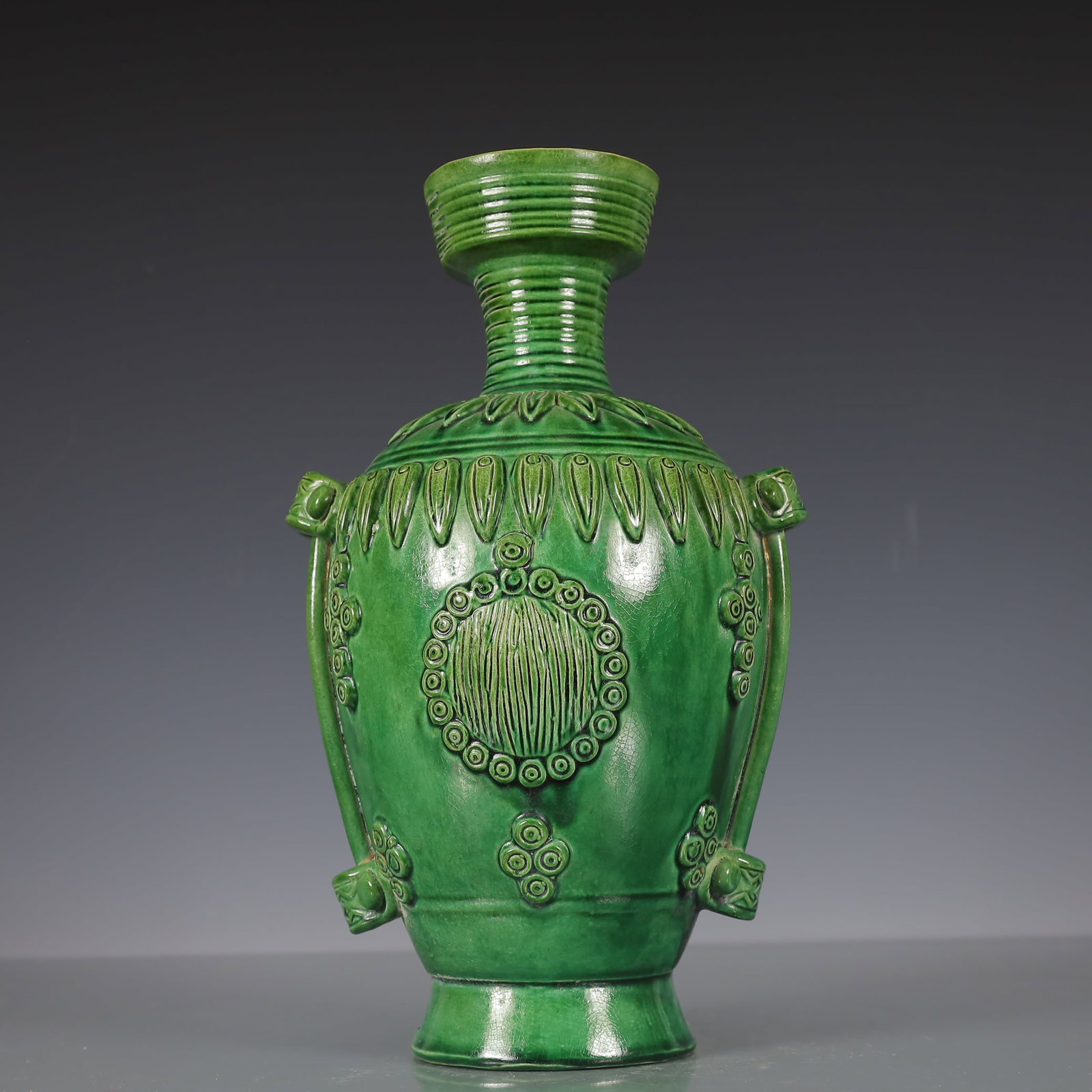 A Exquisite Trio-colored glazed pottery of the Tang Dynasty Flower Pattern Vase : A Exquisite Trio-colored glazed pottery of the Tang Dynasty Flower Pattern Vase Tang Dynasty, China Size:17cmx16cmx28cm Weight:1050g唐三彩花卉纹瓶 中