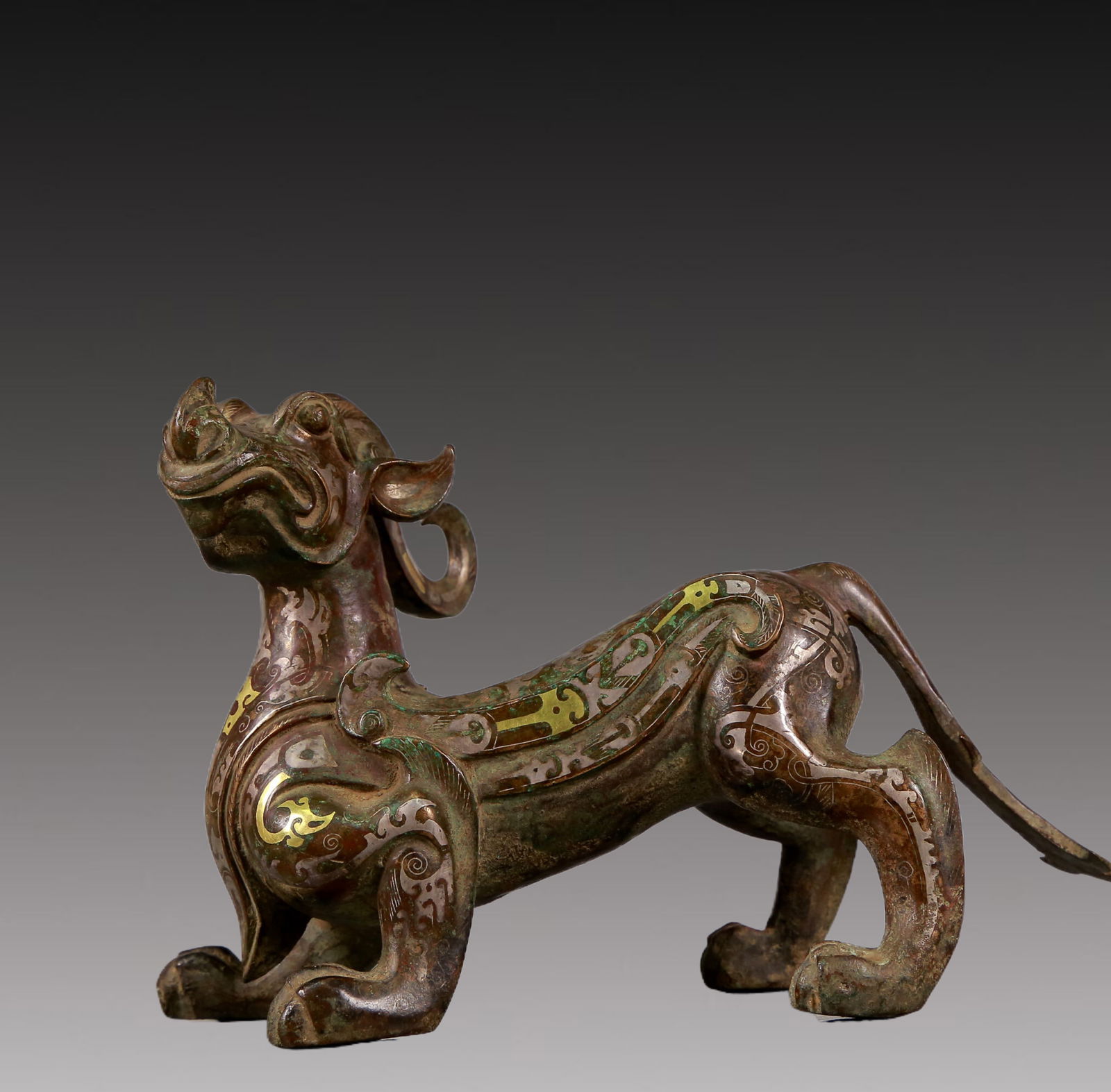 A Rare Bronze Inlaid Gold and Silver Auspicious Beast Ornament (1 of 10)