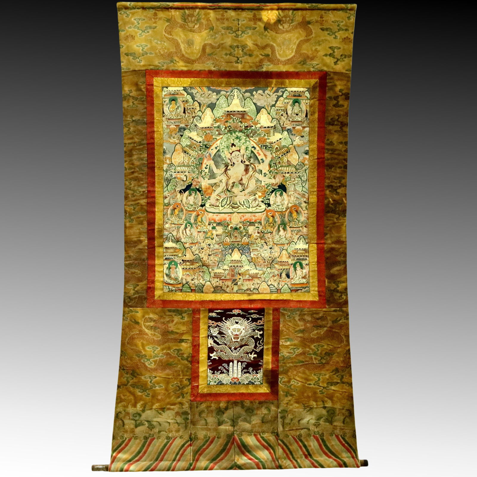 An Exquisite Brocade Painted Color Cowhide Manjuvajra Tangka: An Exquisite Brocade Painted Color Cowhide Manjuvajra Tangka,Qing Dynasty, China,Size：96cmx179cm 织锦彩绘密集文殊金刚像唐
