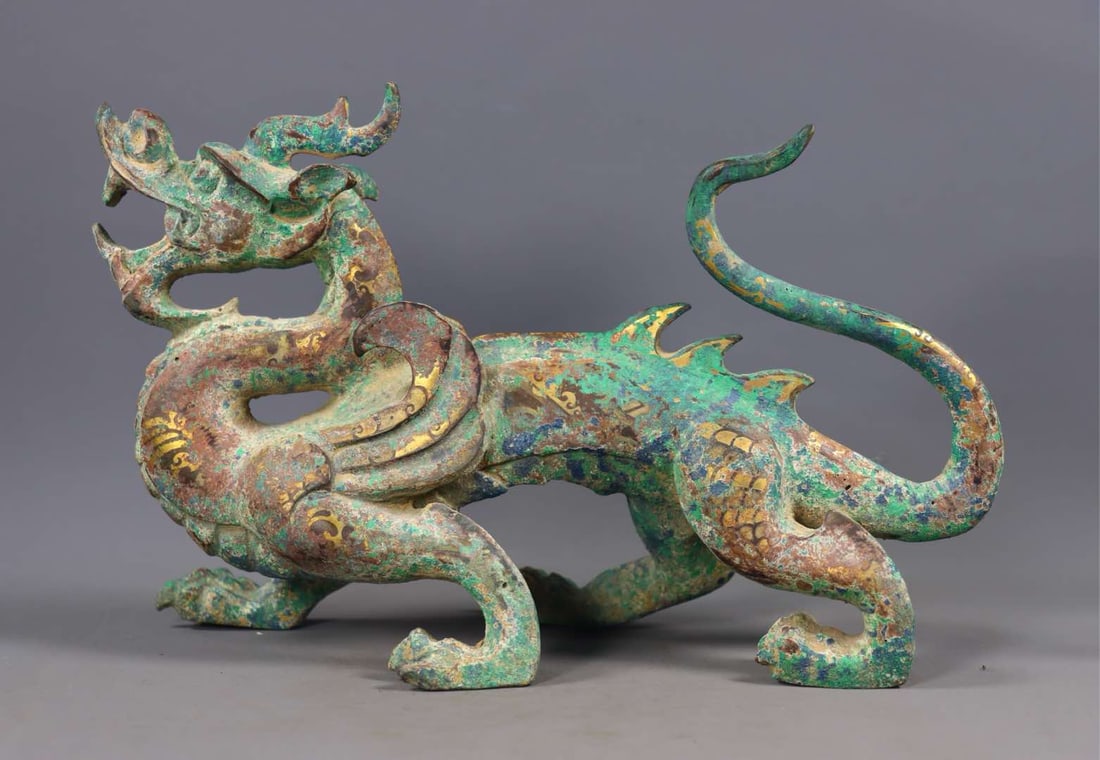 A Rare Bronze Inlaid Gold and Silver Dragon Ornament (1 of 9)