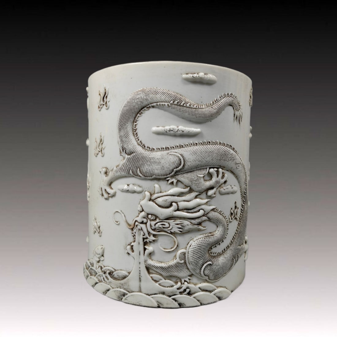 An Exquisite White Glazed Dragon Pattern Brush Pot (1 of 9)