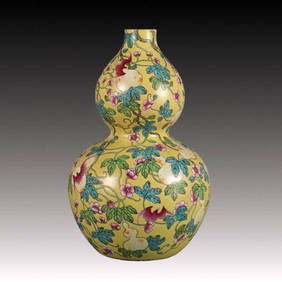 An Exquisite Yellow Ground Famille-Rose Bats and Gourd Pattern Gourd-Shaped Vase (1 of 9)