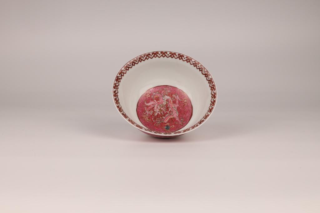 Famille Rose Gilt-Decorated Velvet-Ground Dragon Bowl, Qianlong Mark, 20th Century: China, 20th century Dimensions: 5.6" (14.2cm) Dia, 2.6" (2.6cm) H Six-character Qianlong mark in underglaze red. Famille rose velvet-ground bowl depicting two dragons playing with a ribboned ball. Dec
