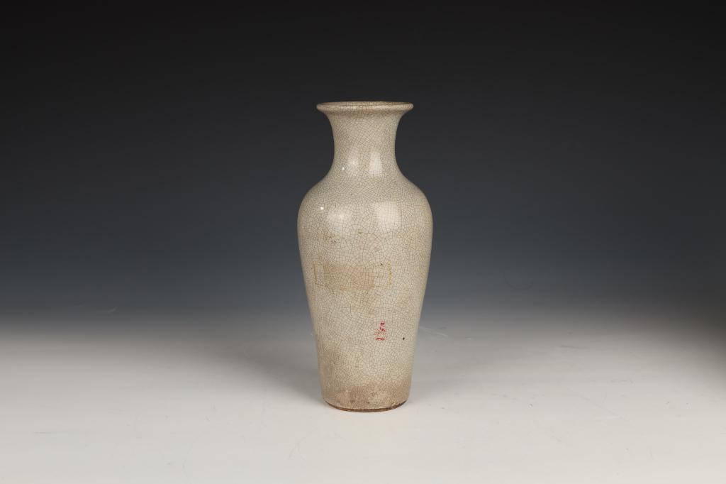 Ge-type Crackle Bottle Vase, Qing Dynasty: China, Qing Dynasty, Tongzhi periodDimensions: 9.7" (24.8cm) HPorcelain vase with greyish cream underglaze and imitation ge ware crackle pattern. Includes certificate of antique issued by China Nation