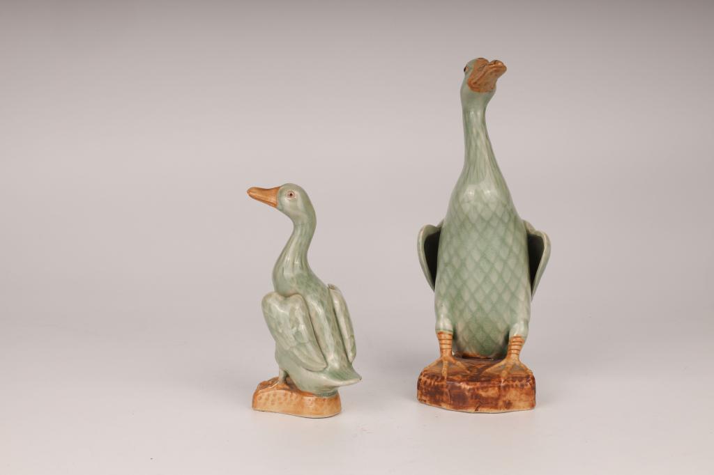 Set of 2 Polychrome Glazed Ducks: China Dimensions: A: 6" (15.2cm) H; B: 9" (22.9cm) H Set of 2 porcelain ducks of different sized covered in celadon and light brown glaze. (2pcs) 豆青瓷鴨子一ಆ