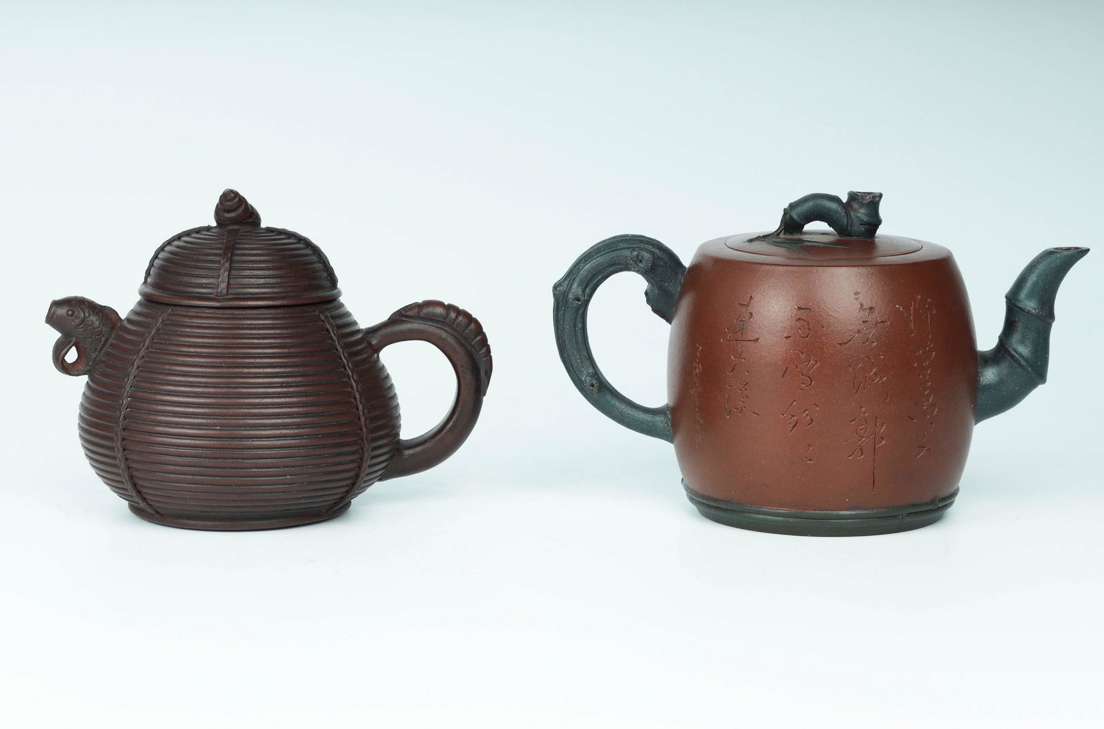 Two Yixing Zisha Teapots (0184) on Jun 18, 2022 Arnaud's Auctions