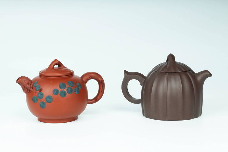 Two Yixing Zisha Teapots (0186) on Jun 18, 2022 Arnaud's Auctions