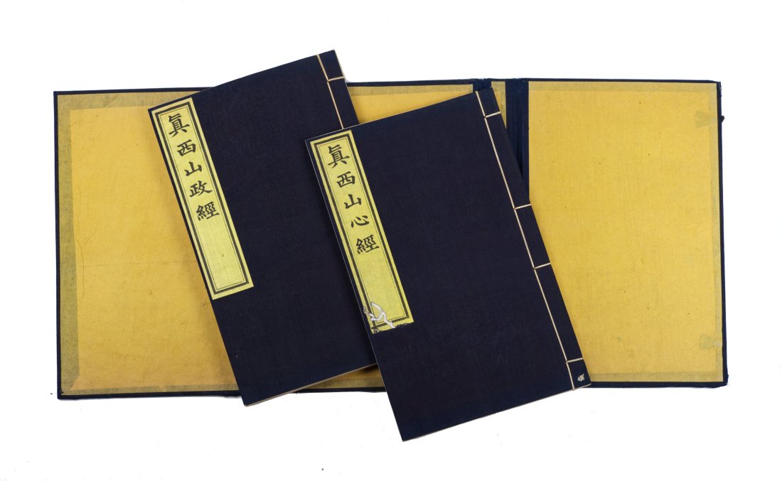 Antique Chinese Book Zhen De Xiu Xin Jing, Qing Dynasty: China, Qing dynasty, Guangxu period Dimensions: 13 1/2" (34.3cm) L, 9" (22.9cm) W, 1 1/2" (3.8cm) H (2) Text in traditional Chinese. Paper covers, string four hole stab binding. Provenance: Yangtze Ar