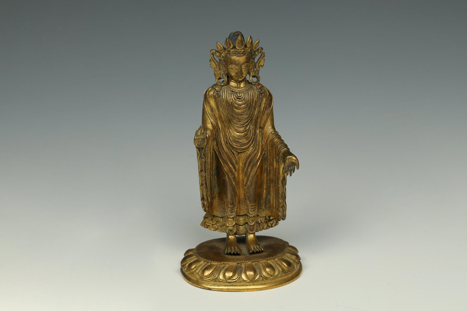 Gilt Copper Alloy Figure of Crowned Dayana Buddha, Qing Dynasty 18th century: Dimensions: 6 1/2" (16.5cm) H 19世纪站立铜鎏金佛像