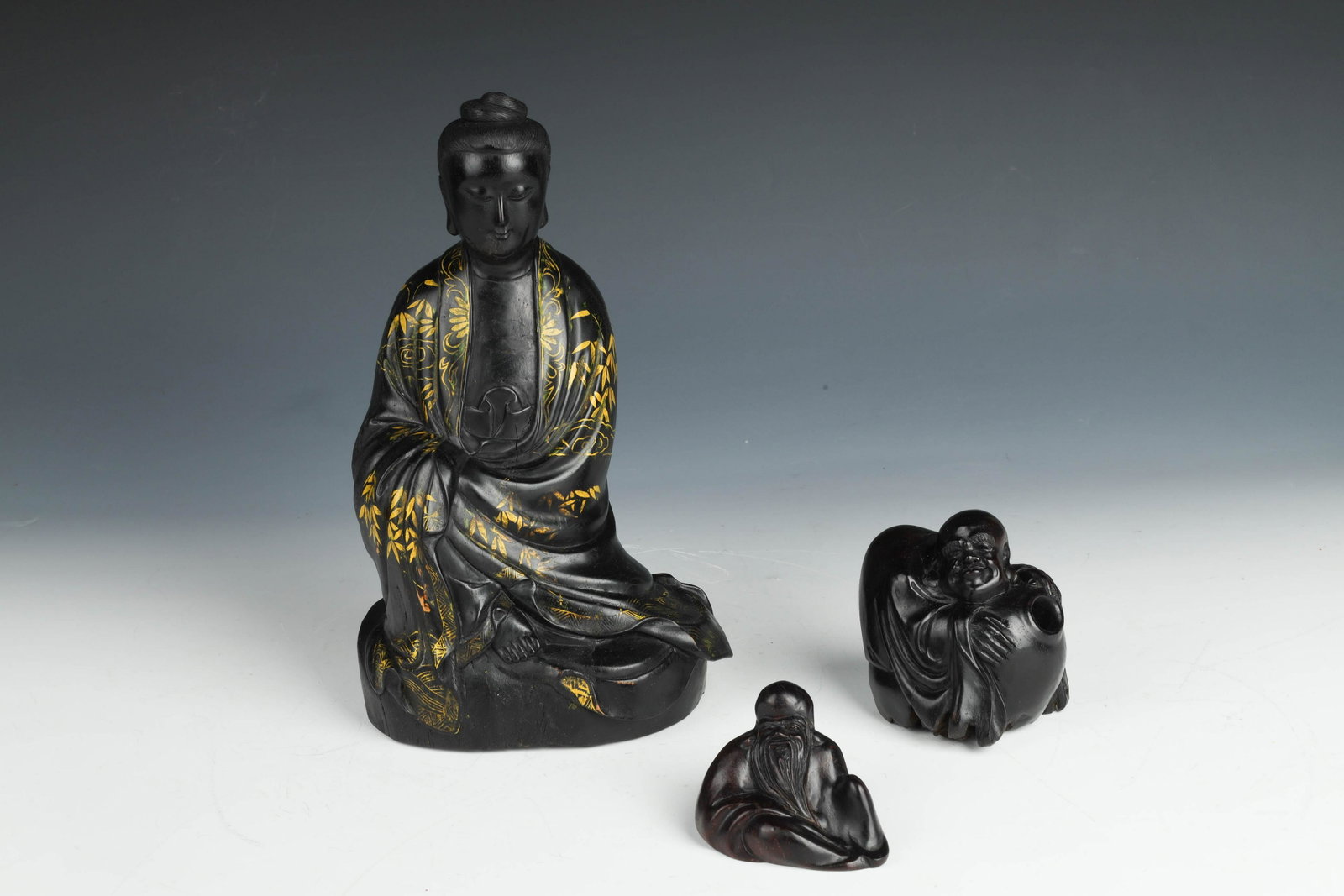 Zitan Gilt Lacquered Carvings - Guanyin, Shoulao, Budai (3): （1）9 3/4" (25cm) H，(2) 3 1/2" (9cm) H, (3) 2" (5cm) H 人物坐像,紫檀人物两件