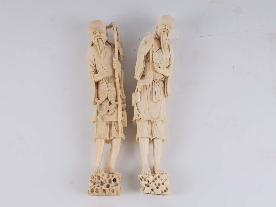 Two bone sculptures of human figures: Dimensions: 31cm H,