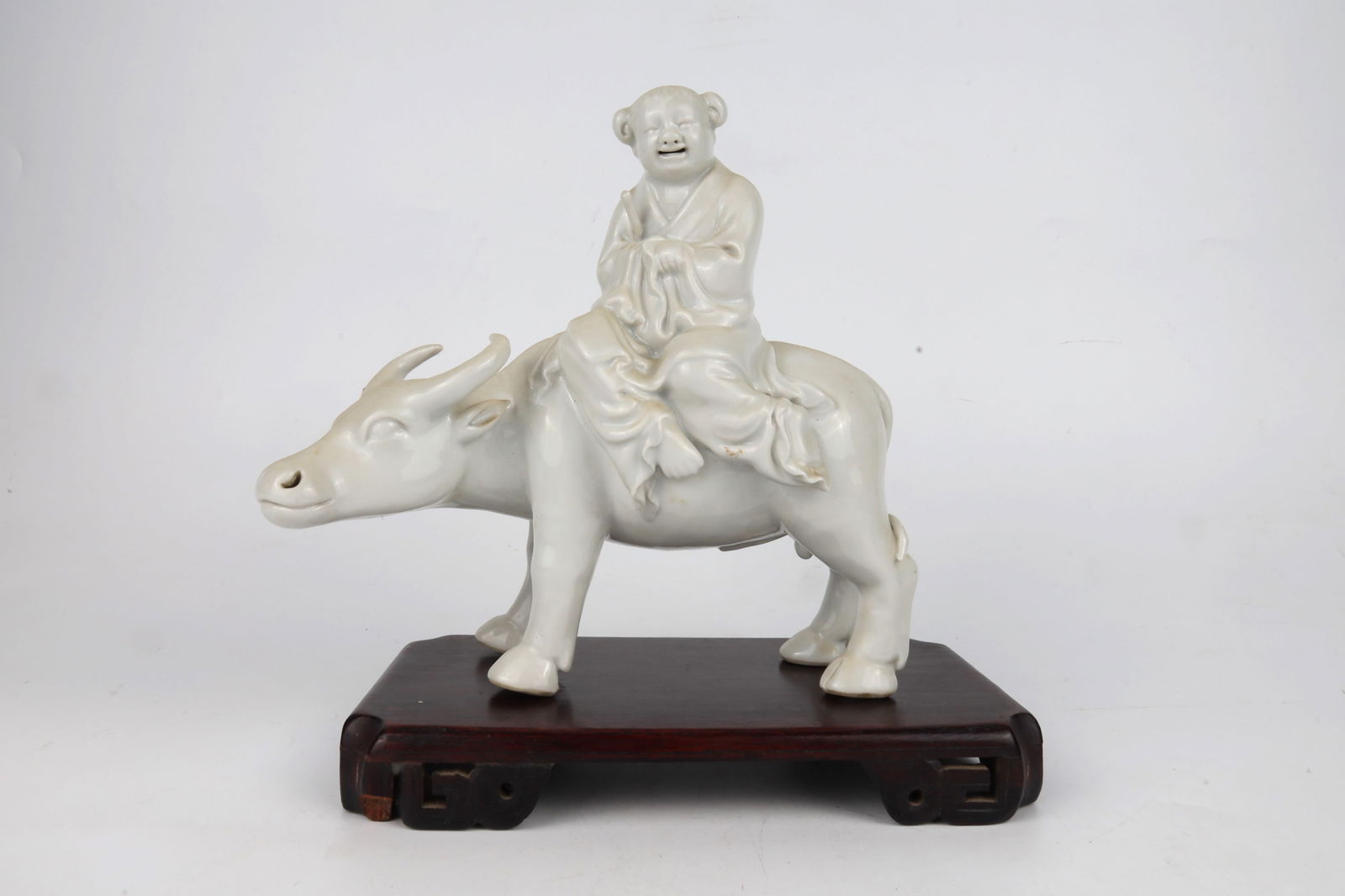 Dehua Blanc de Chine Figure of Boy Riding an Ox China 20th Century: Dehua Blanc de Chine Figure of Boy R
