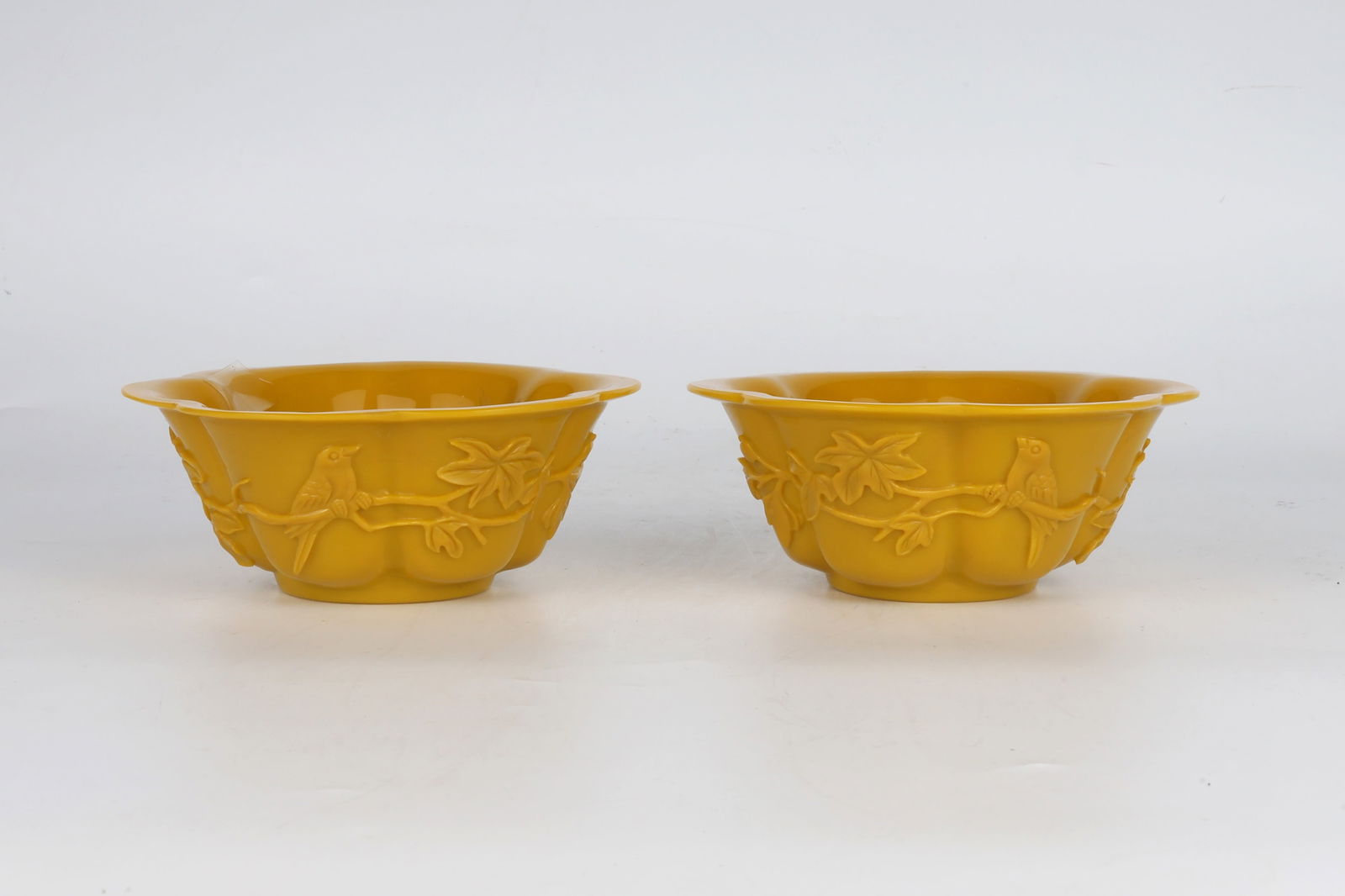 A Pair of Yellow Glazed Relief Decorated Bowls with Flowers and Birds China 20th Century (1 of 3)