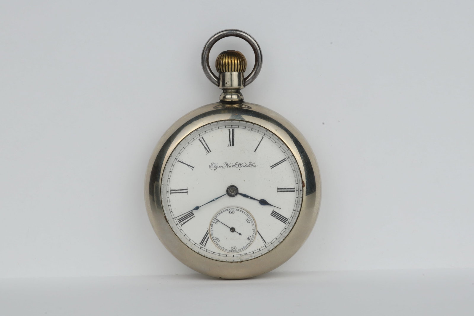Elgin Pocket Watch: Elgin Pocket WatchMovement Serial Number: 3346559Grade: 75Model: 5Estimated Production Date: 1889Size: 18sJewels: 15jMovement Setting: PendantWind Mechanism: PendantCase Metal: SilveroidDimensions: 5.
