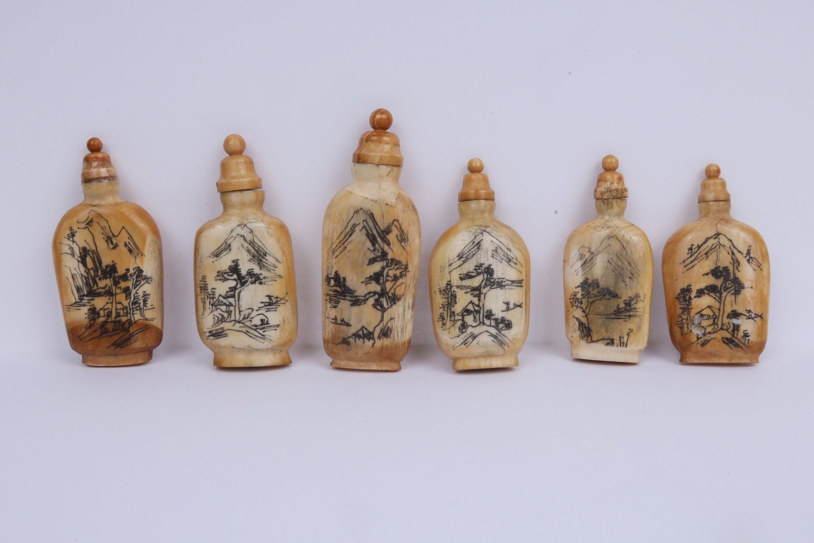 A Set of Carved Bone Snuff Bottles China 20th Century (1 of 4)