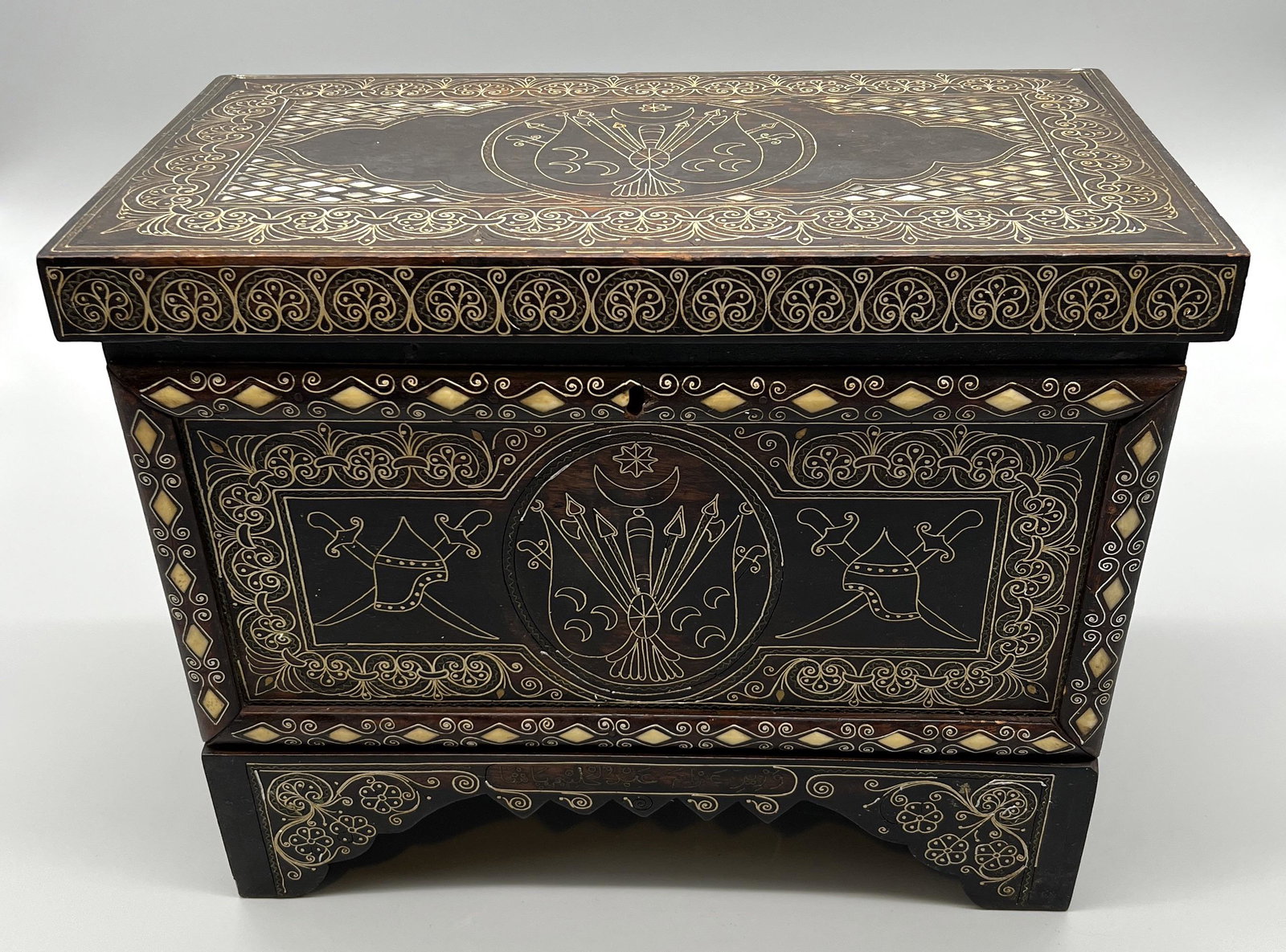 18th C. Turkish Ottoman Empire Inlaid Ebony Wooden Chest: 18th C. Turkish Ottoman Empire Chest, ebony wood, inlaid with mother-of-pearl shells and bone, silver and brass metal wire Islamic scrollwork, red mohair velvet lining, does not have a key for the loc