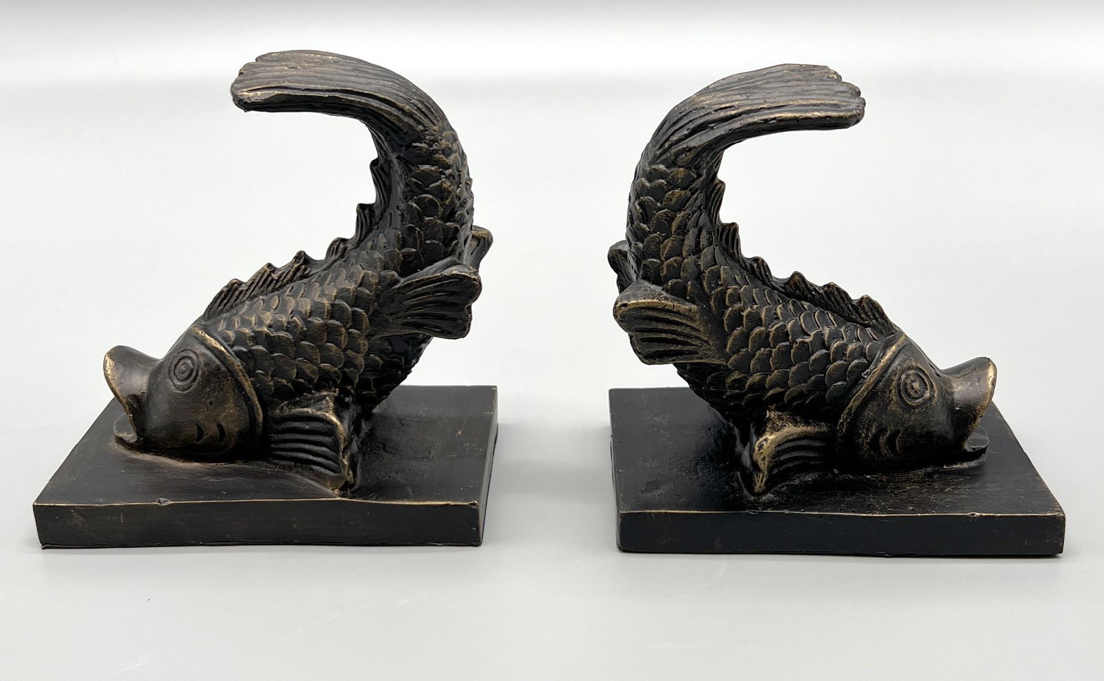 Set of Iron Figural Koi Fish Bookends: Set of Iron Figural Koi Fish Bookends, bronze finish with gold accents, 5" L x 3" W x 5.5" H (each)