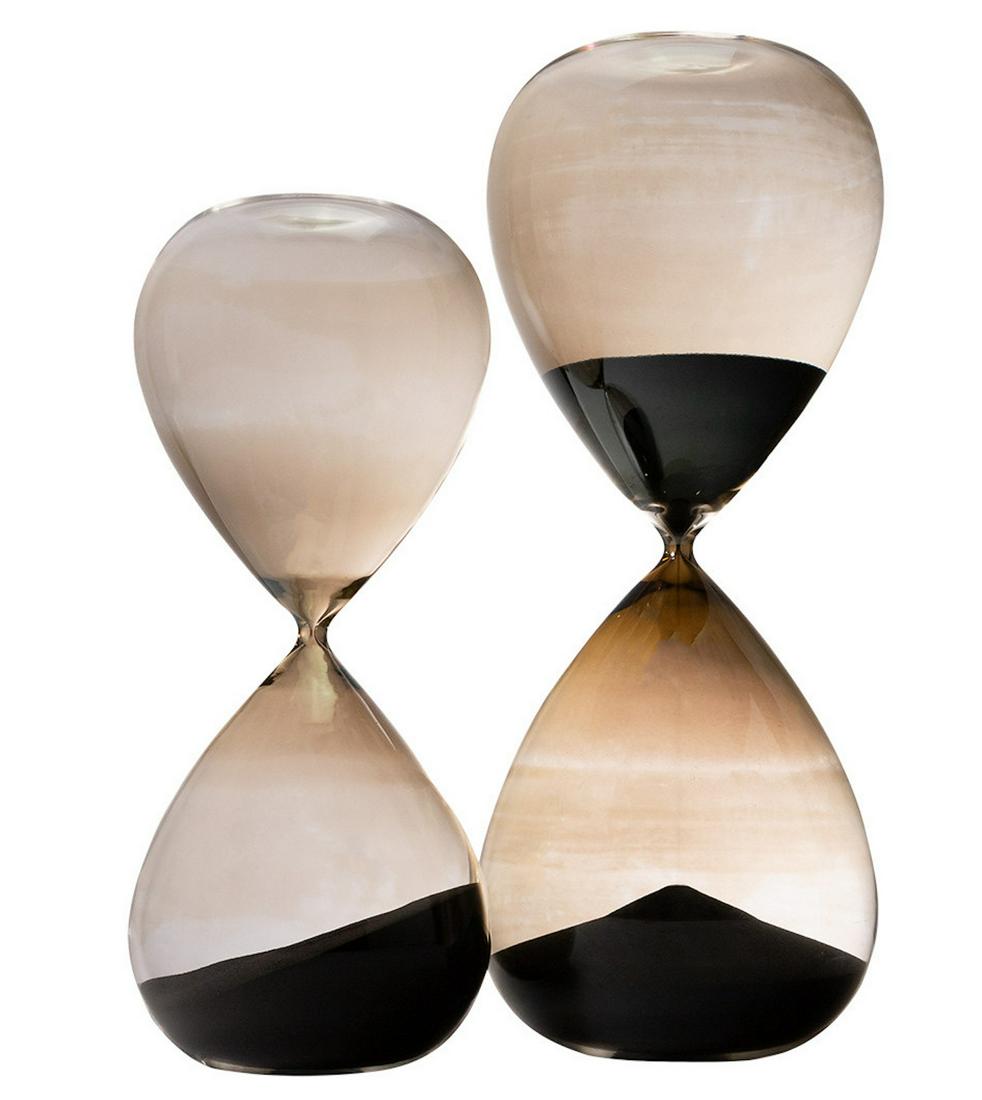 Set of Two Large Hourglasses: Set of Two Large Hourglasses A contemporary set of decorative objects, made of blown glass with black sand. Dimensions: height 18 in., diameter 7 in., large; height 14.5 in., diameter 6 in.,