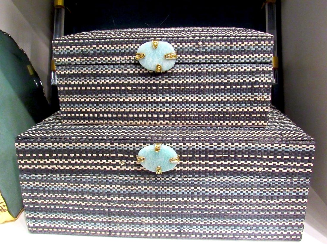 Set of Two Abaca Boxes: Set of Two Abaca Boxes A contemporary set of decorative boxes clad in woven abaca leaves, stone handles, and an interior lined with velvet. Dimensions: height 5 in., width 13 in., depth 10 i