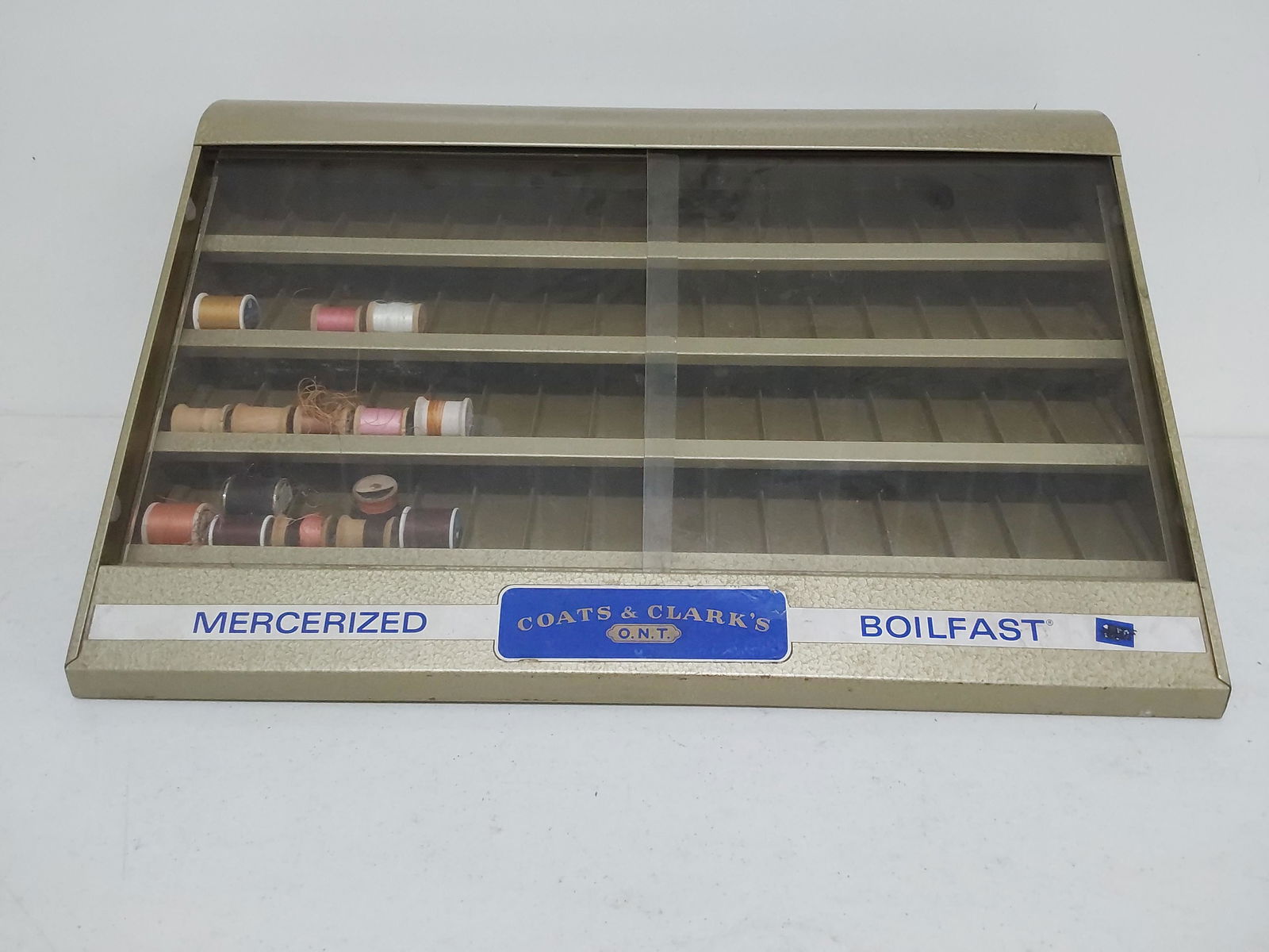 Coats and Clarks metal spool cabinet: 23 1/4"L x 10"H x 14 1/2"D