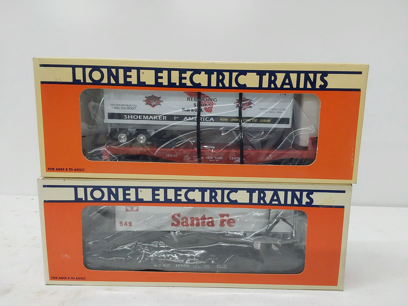 Lionel: Santa Fe flat car with trailer - No. 6-17502 Red Wing Shoes flatcar with trailer - No. 6-16953