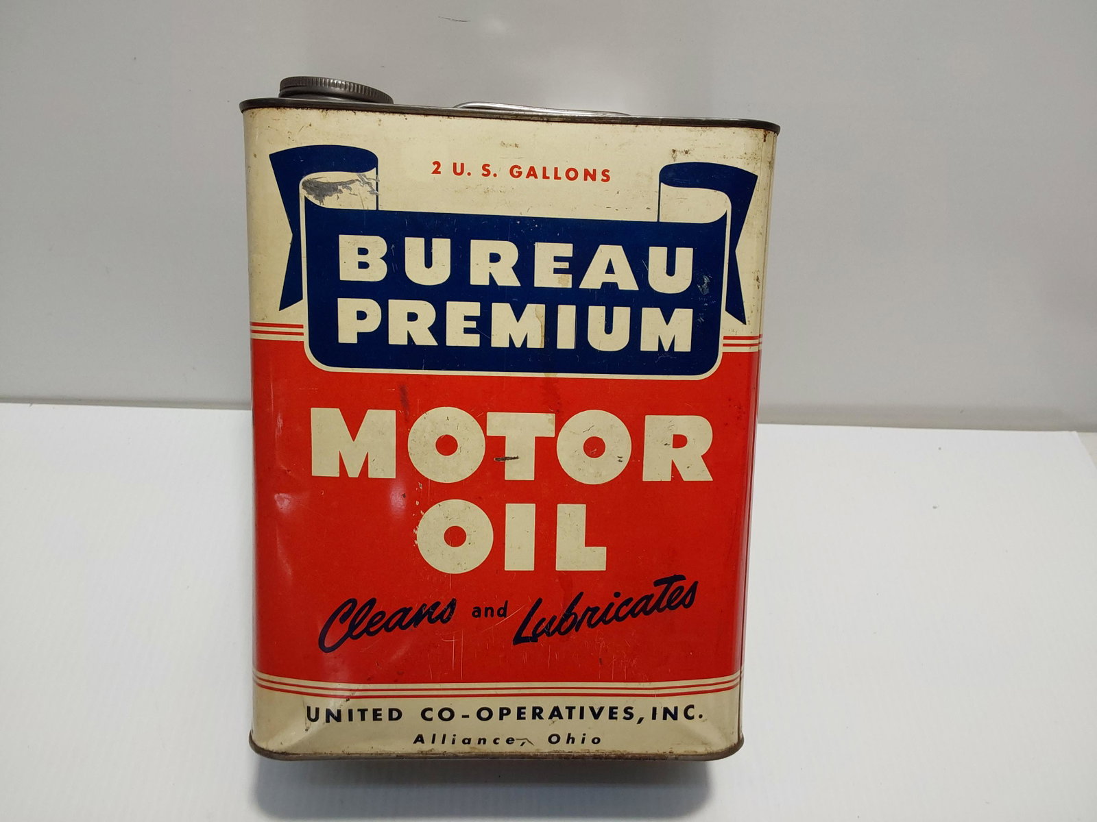 Bureau Premium oil can: 2 gallon can, has dent