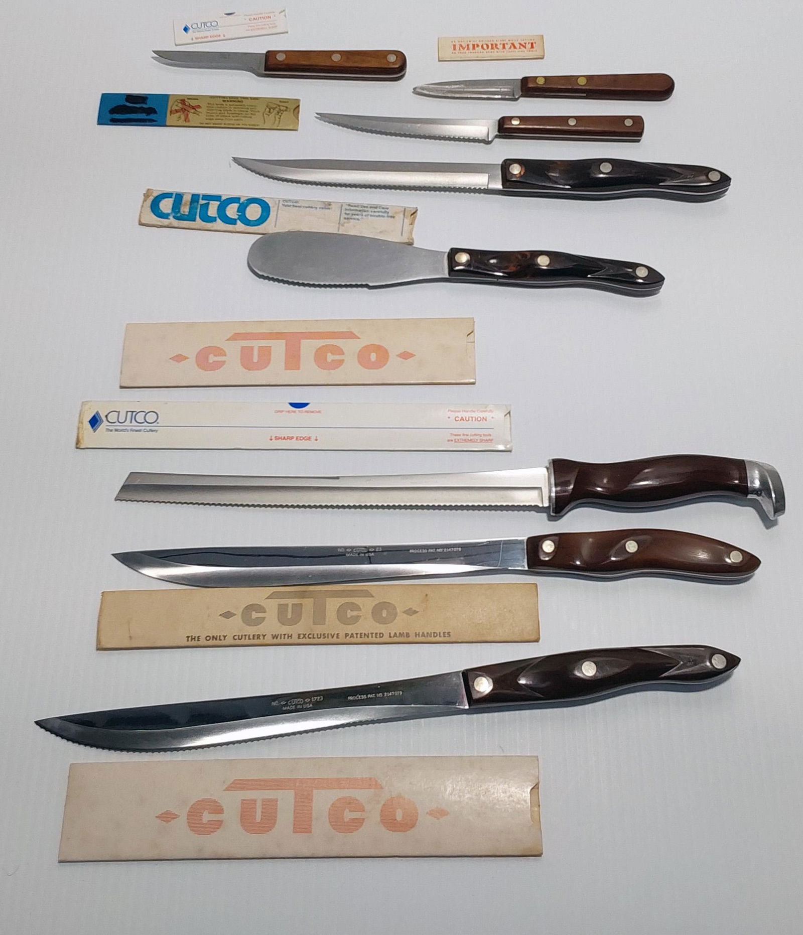 (8) fixed blade kitchen knives: (1) Case XX (P 599 3") (1940-1964), paring knife, 3" blade with 3 3/4" hardwood handles (6 3/4" overall) Used. (1) Robeson Stainless USA (Pre Queen Cutlery) paring knife, 3" blade with 4" hardwood han
