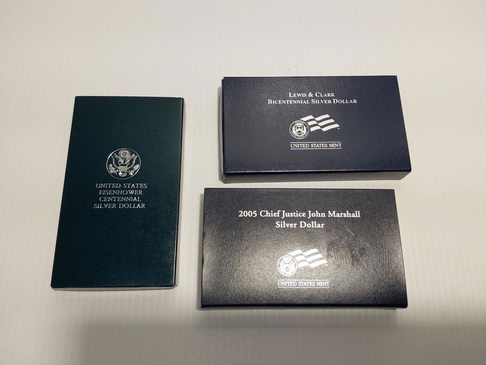 (3) silver proof dollars: Lewis & Clark, Eisenhower and Chief Justice John Marshall