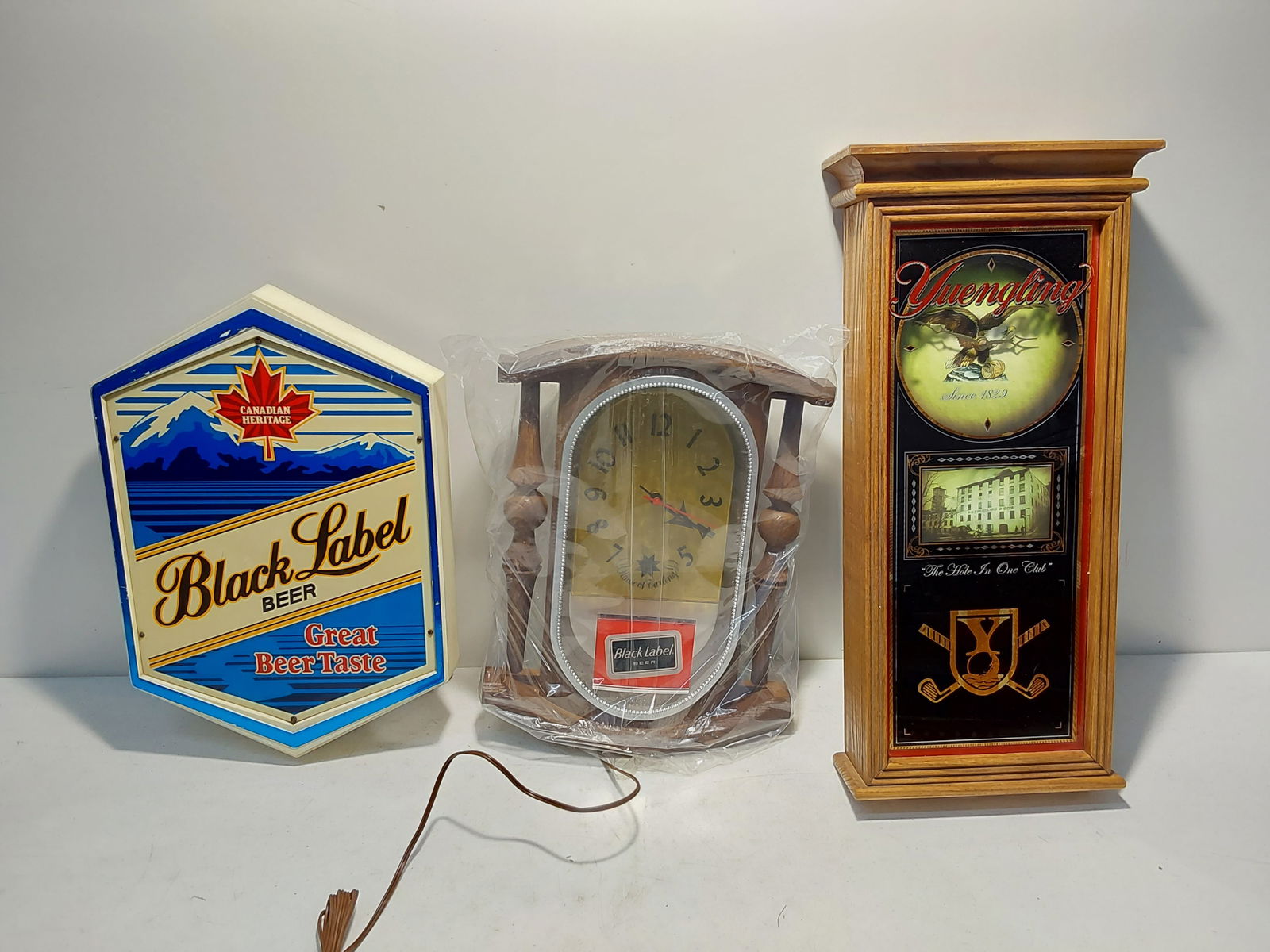 Black Label lighted sign and Yuengling clock (1 of 2)