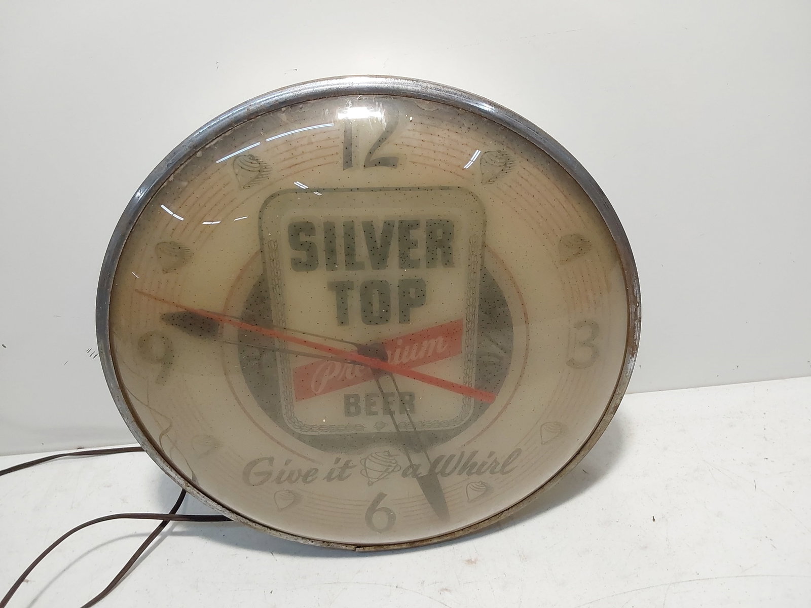 Silver Top Beer clock: Lights up, clock does not work. Has some flaking.