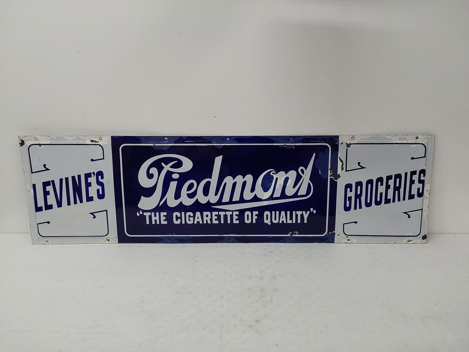 Piedmon's Cigarette SSP sign with Levine's Grocery (1 of 3)