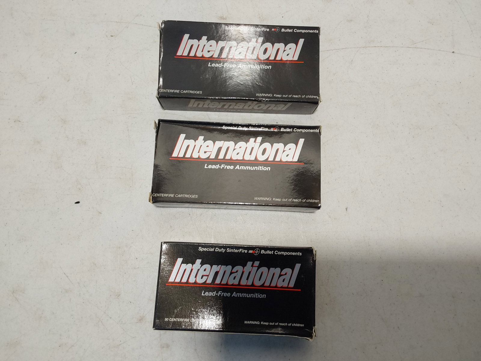 (3) boxes of International ammunition: 38 SPL, 40 S/W and 45 Auto