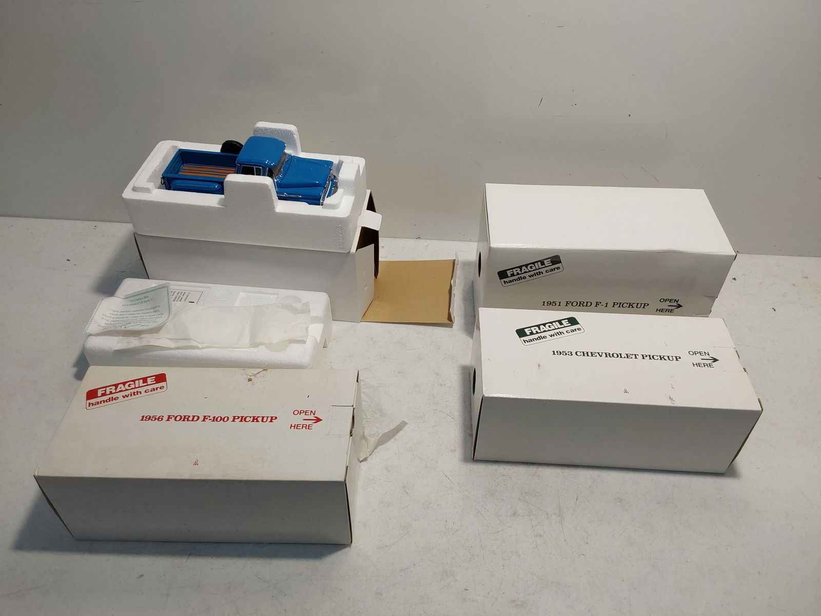 (4) Danbury Mint pickup trucks: in original boxes