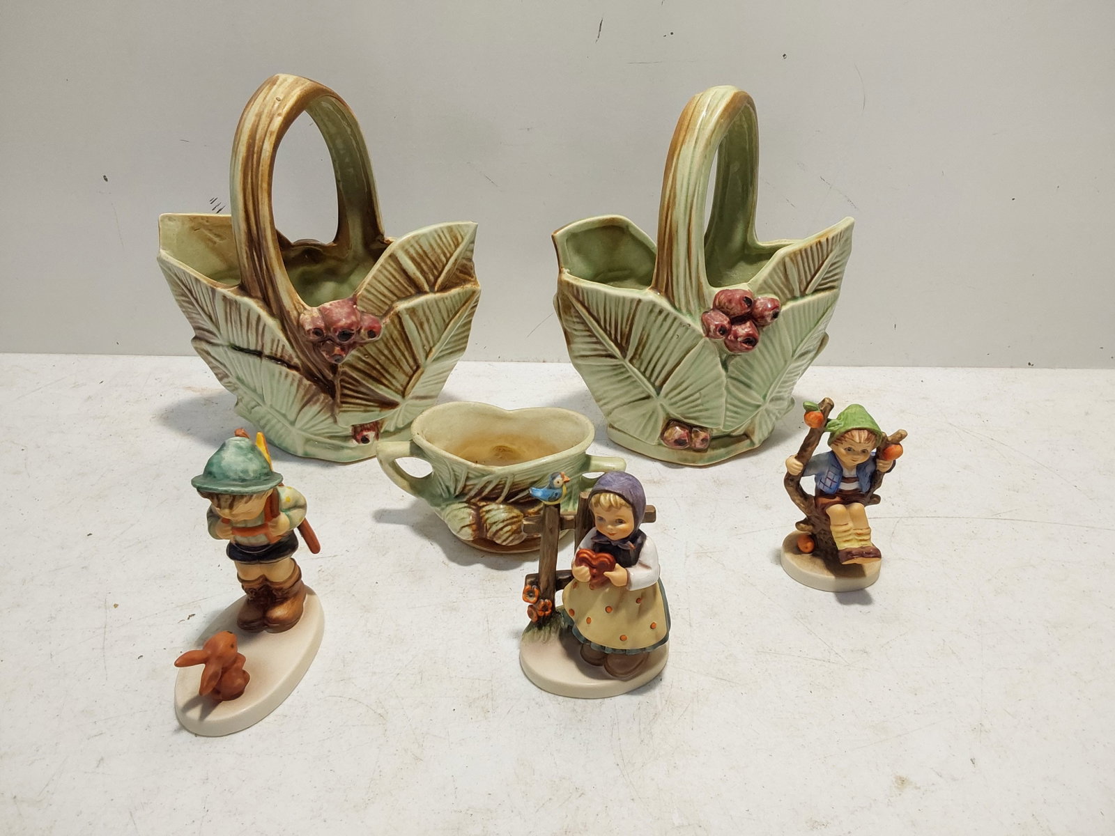 McCoy flower basket planters and (3) Hummels: McCoy flower basket planters and (3) Hummel figures