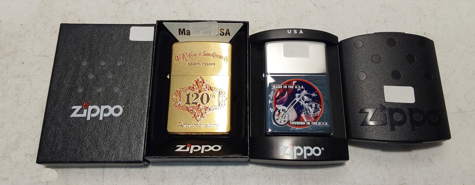 (2) unused collectible Zippo lighters: (1) 2005 Orange County Chopper/Case Motorcycle Tour, high polish chrome finish Zippo lighter in box. Unused. (1) 2009 Case 120th Anniversary brush brass Zippo in box. Unused.