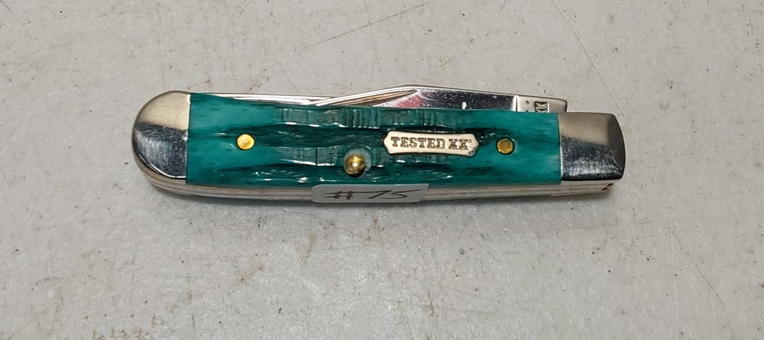 2021 2-blade Tiny Trapper knife: 2021 2-blade Tiny Trapper (62154 SS), 2" California clip and 2" spey blades, (2 1/2" closed, jigged Teal Blue handles with Tested XX Shield, without box. Unused.