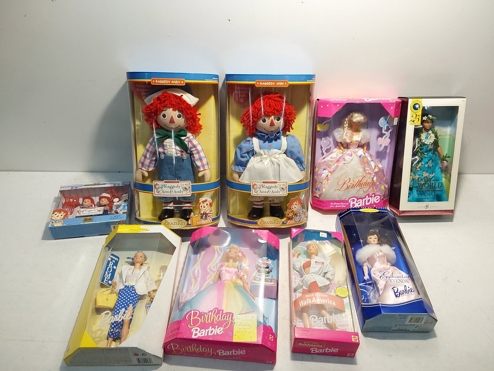 (6) Barbie dolls and (3) Raggedy Ann and Andys: (6) Barbie dolls and (3) Raggedy Ann and Andys