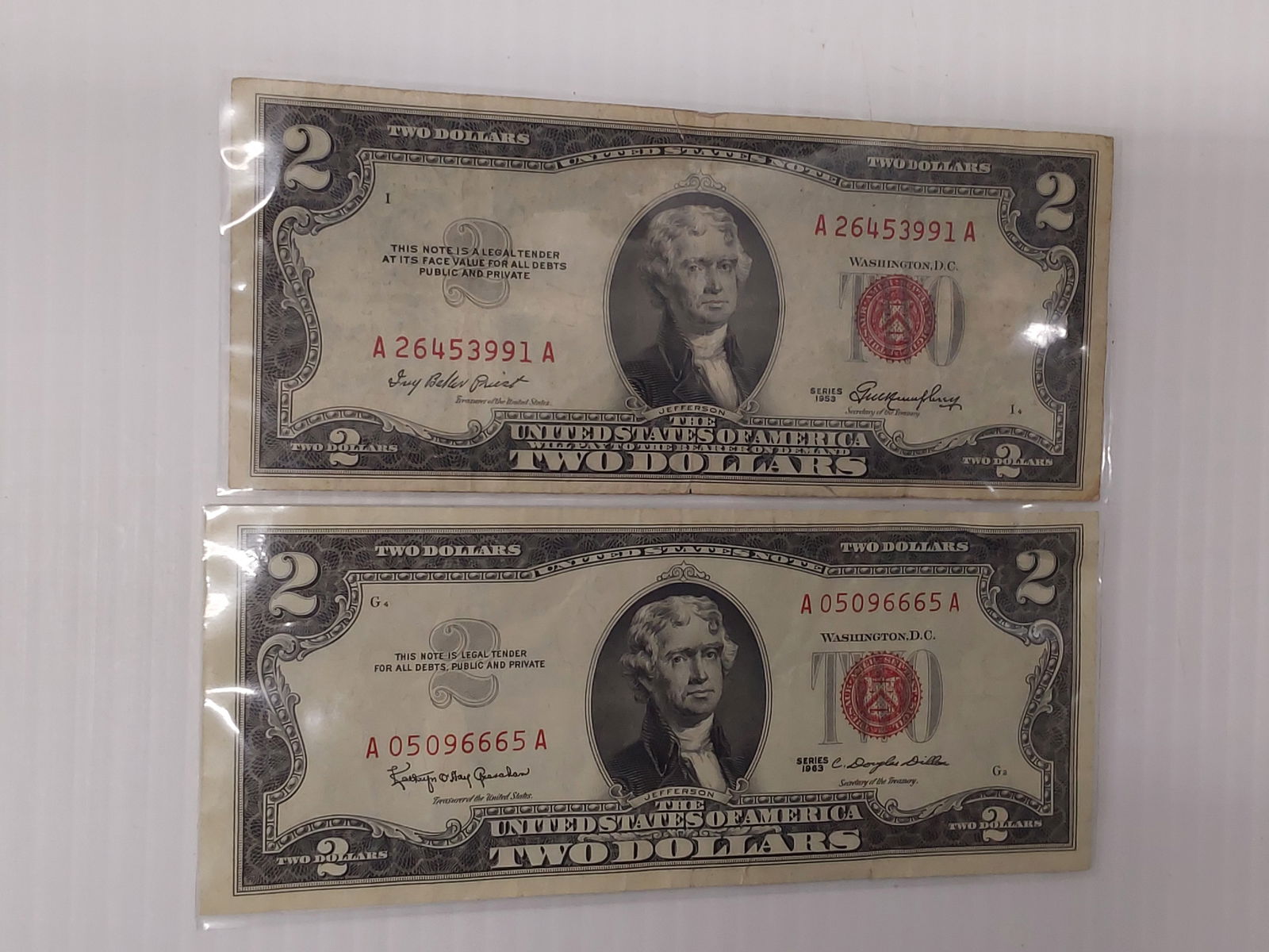 (2) $2.00 red seal notes (1 of 2)