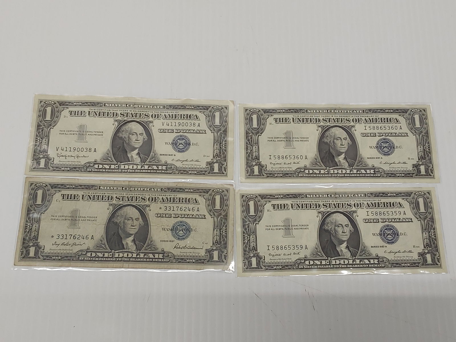 (4) $1.00 silver certificates (1 of 2)