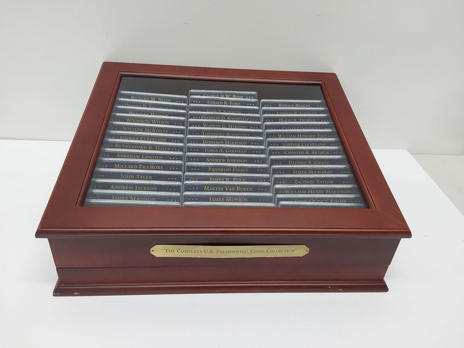 Presidential dollars in wood box (1 of 2)