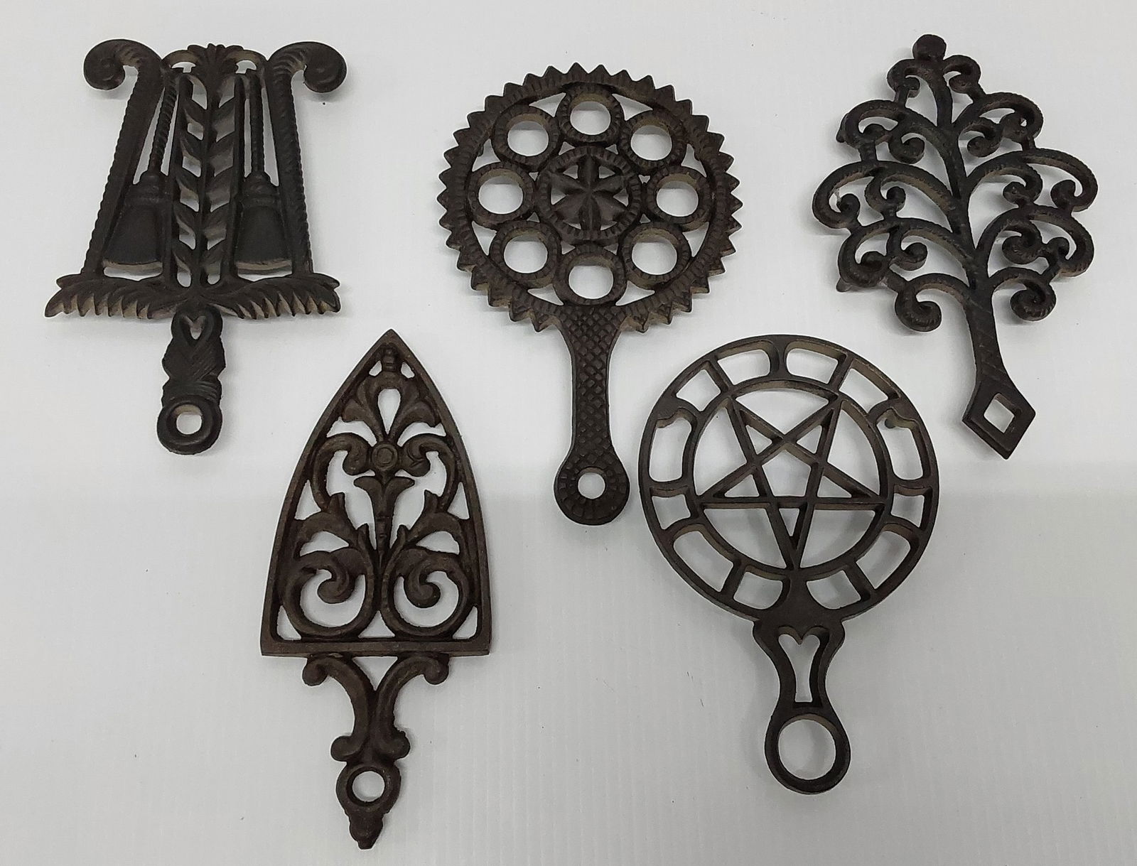 (5) Griswold trivets: approximately 8-9" long